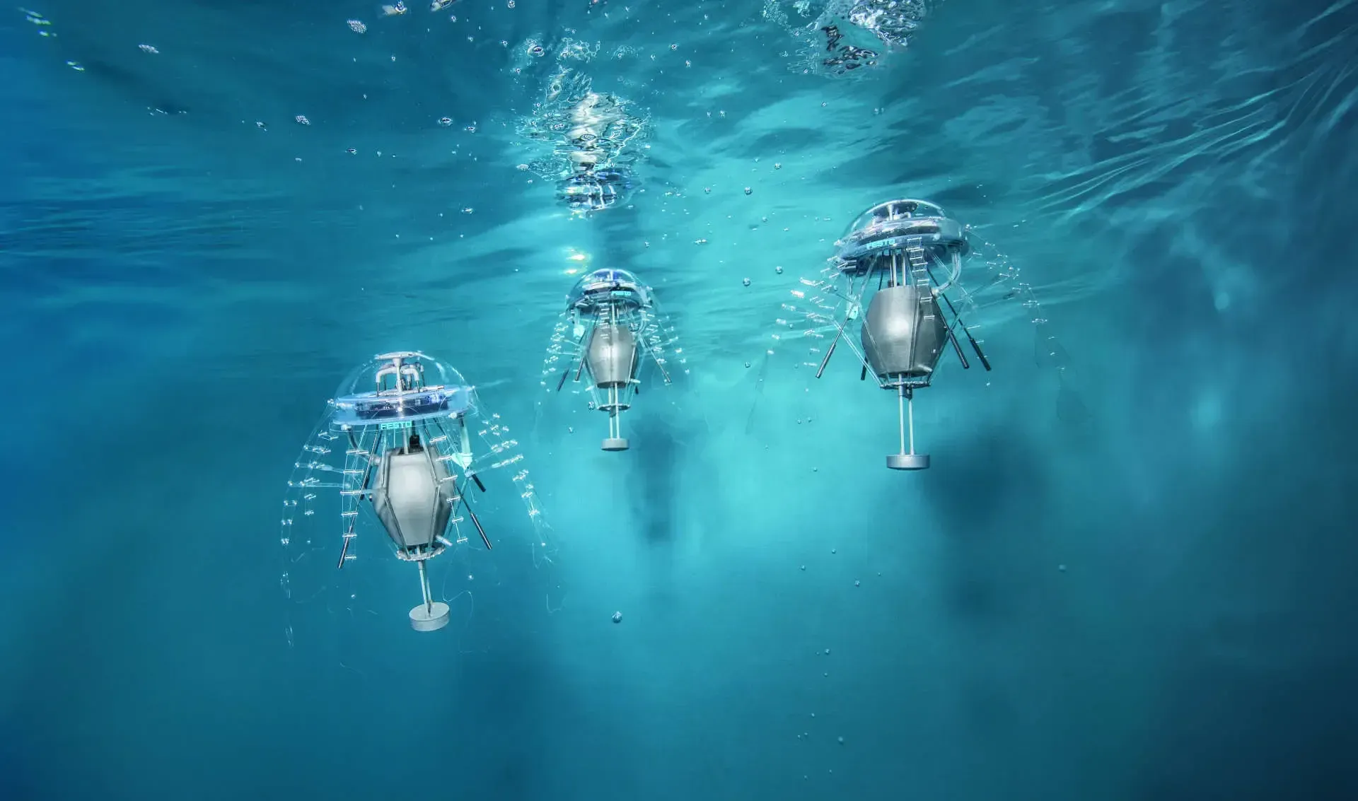 Robotic jellyfish swimming in blue water