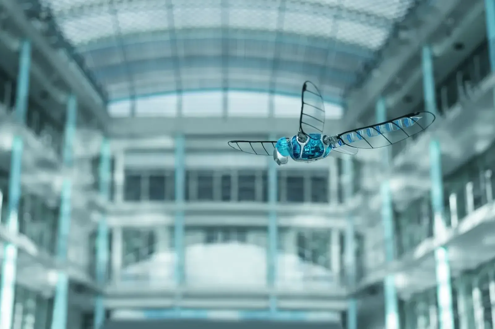 The BionicOpter robotic dragonfly flying in a glass atrium