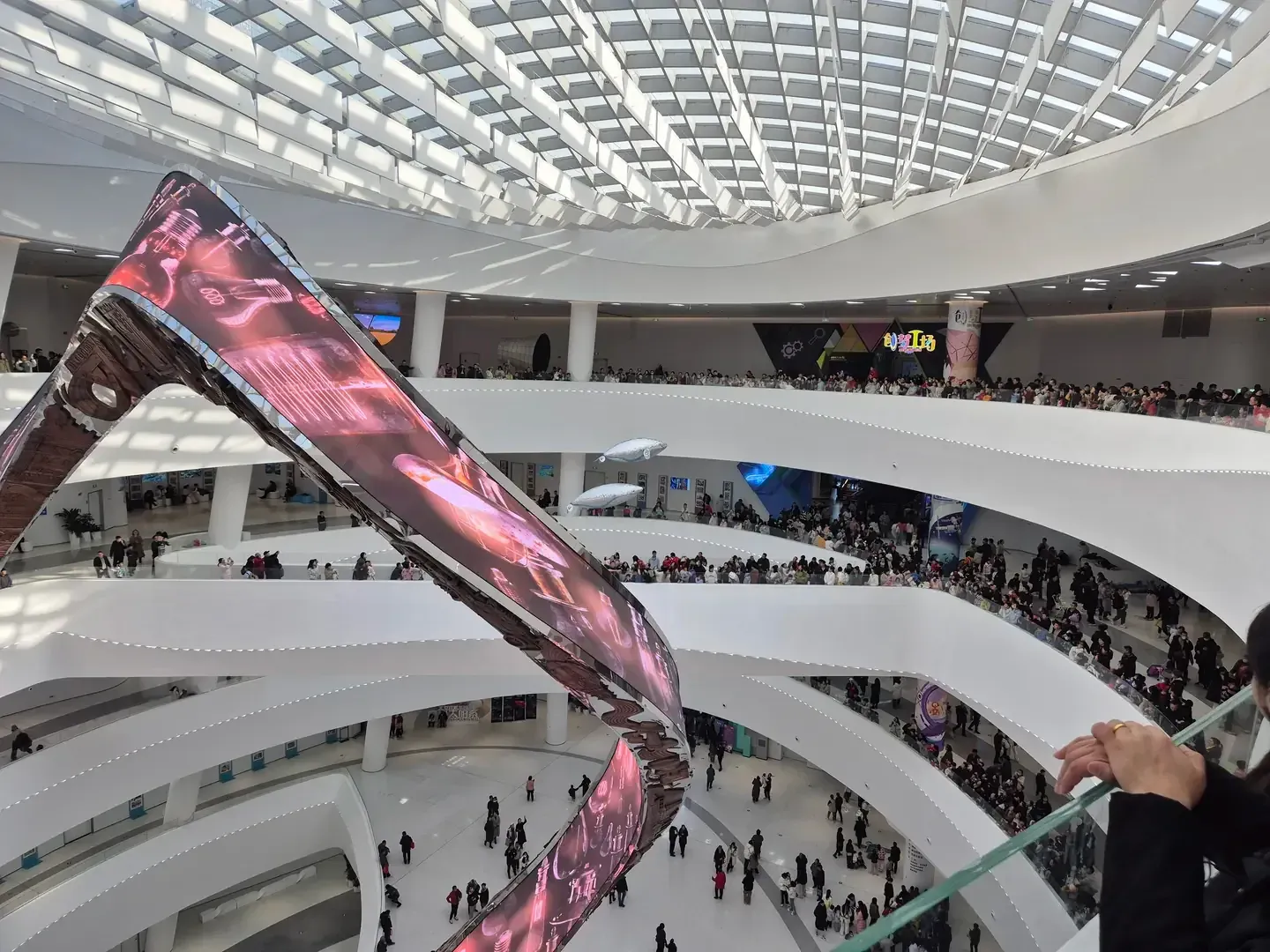 Giant autonomous flying fish gliding through the atrium of the Xi’an Science and Technology Museum